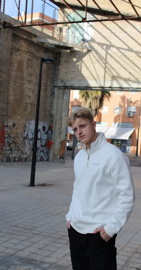 halfzip offwhite voor.webp